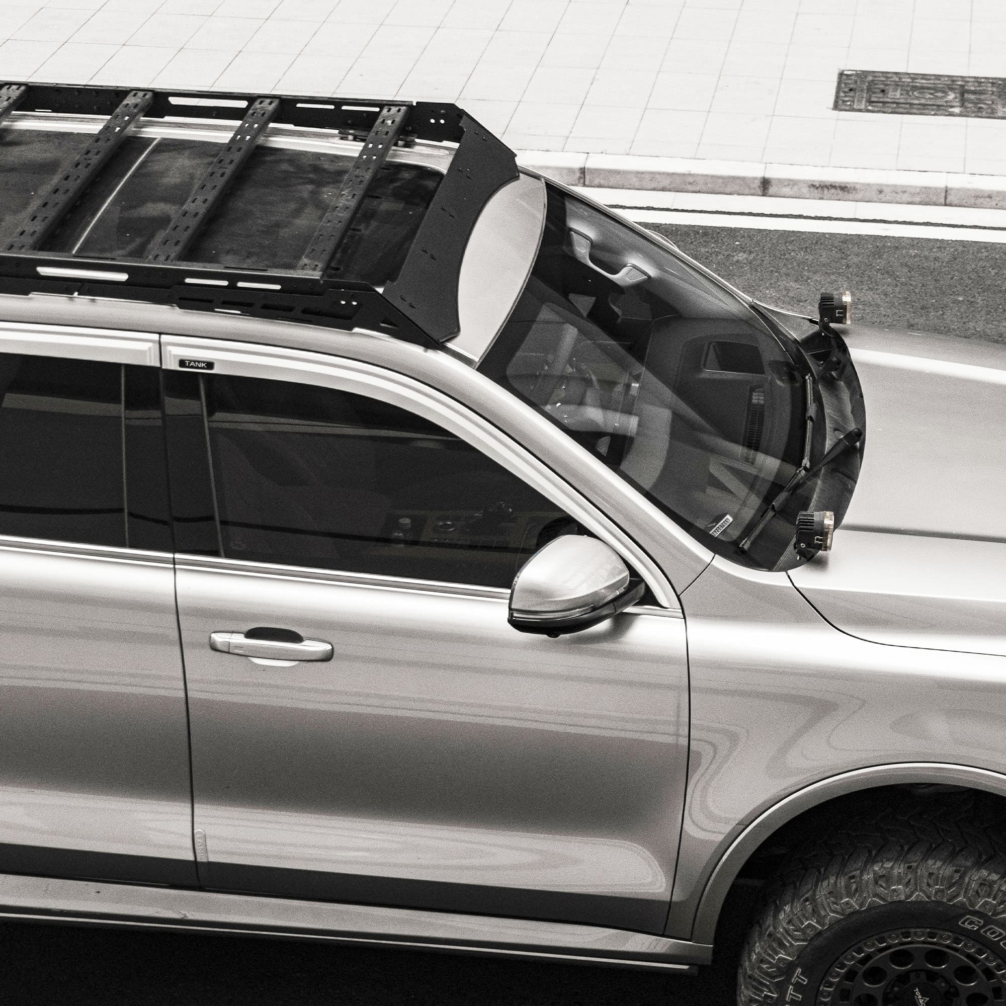 Roof rack installed on a silver Tank vehicle, viewed from above