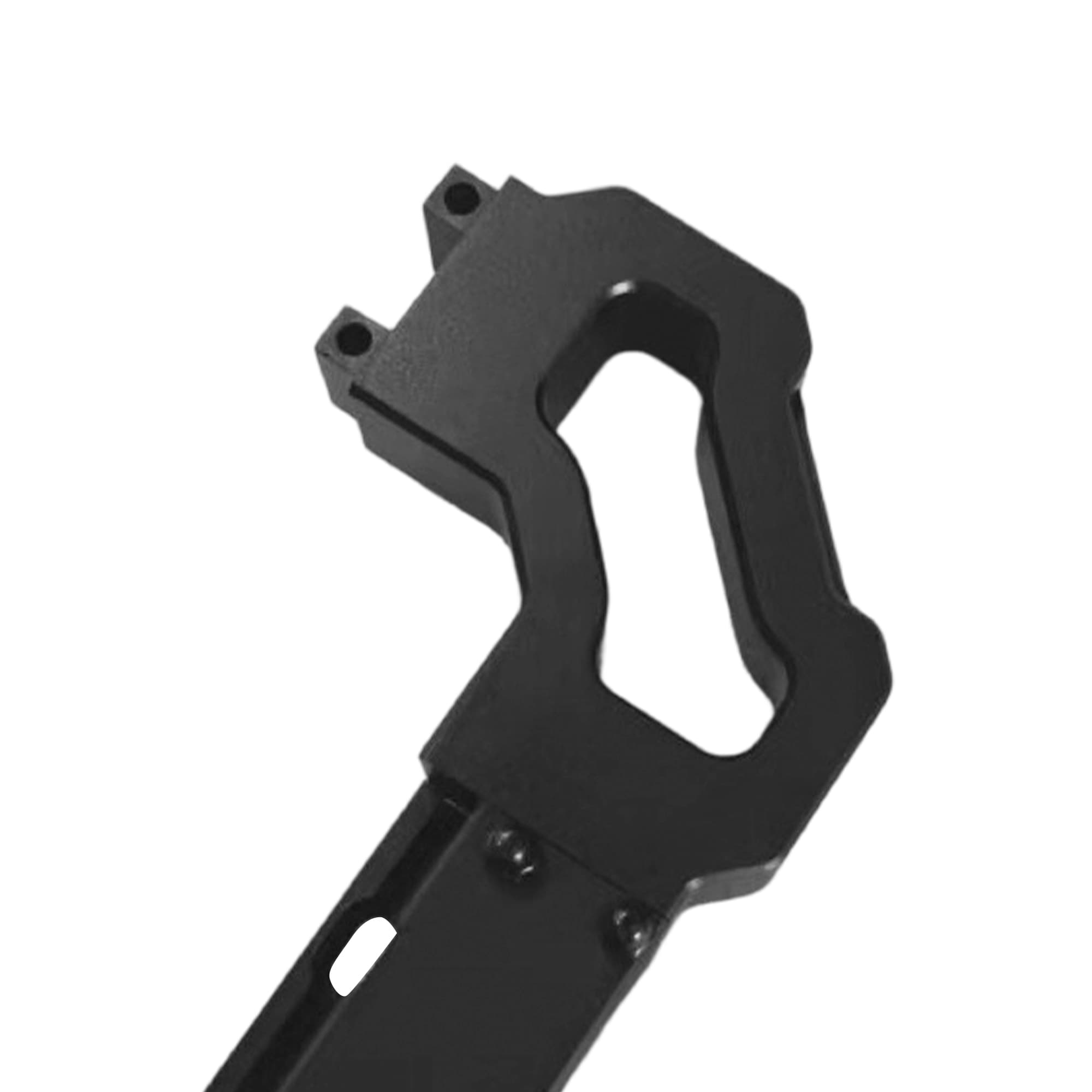Close view of a black bracket with two mounting holes and an open slot on a white background